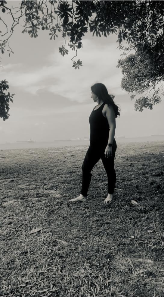 Karuna practicing yoga, seaside